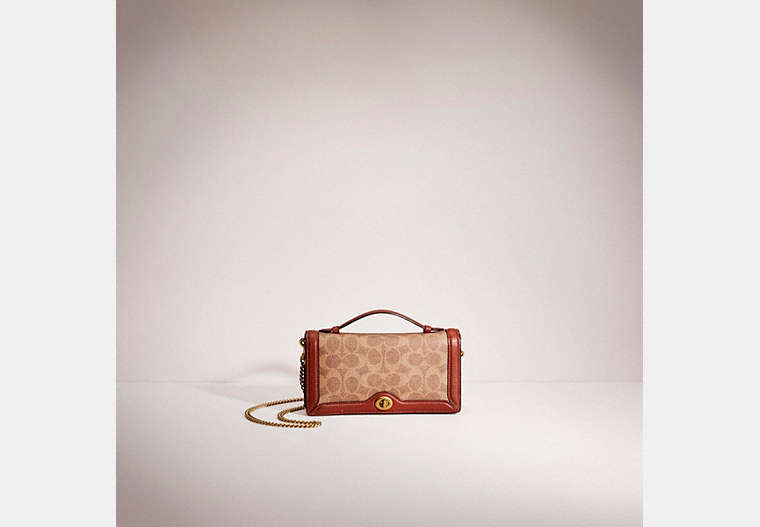 Restored Riley Chain Clutch In Colorblock Signature Canvas