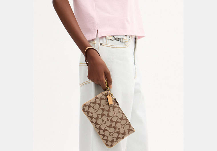 Essential Small Wristlet In Signature Jacquard