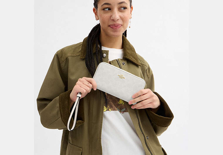 Long Zip Around Wallet In Signature Canvas
