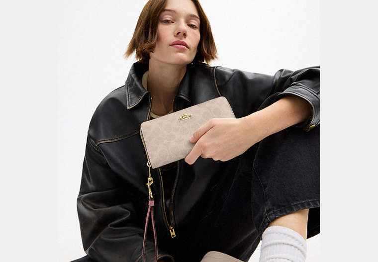 Long Zip Around Wallet In Signature Canvas