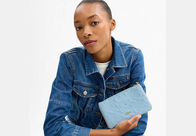Ashton Wristlet In Signature Leather