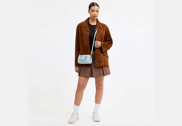 Mini Rowan Crossbody Bag In Signature Canvas