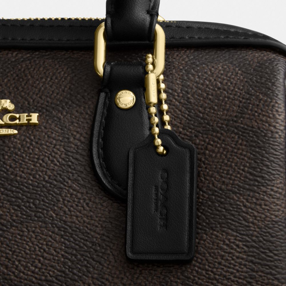 Coach Mini Rowan Crossbody Bag In Signature Canvas Gold Walnut Black