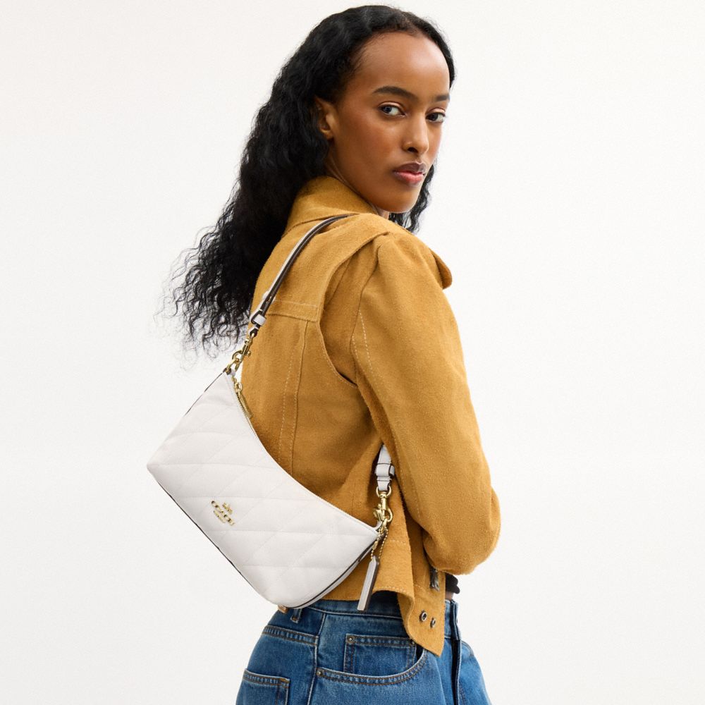 Coach Caitlin Shoulder Bag With Quilting And Charm Gold Chalk