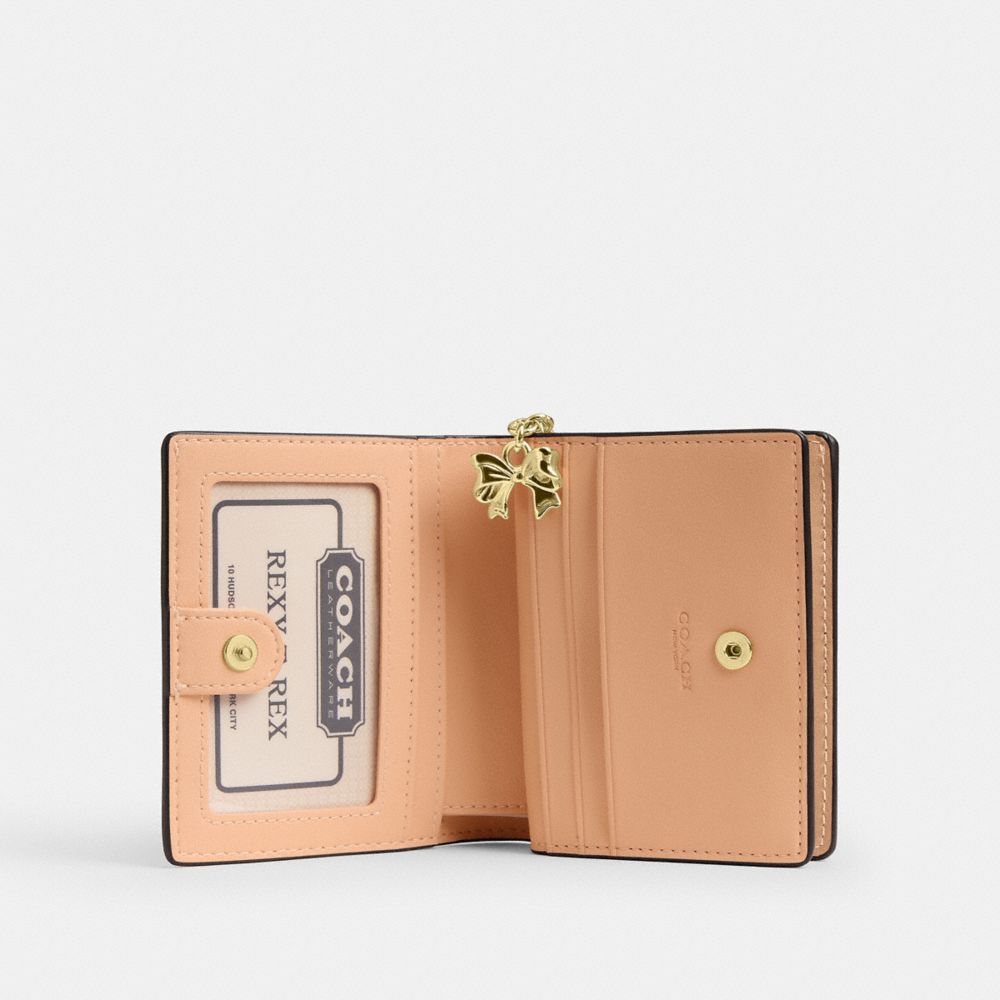 Snap Wallet In Signature Leather With Charm