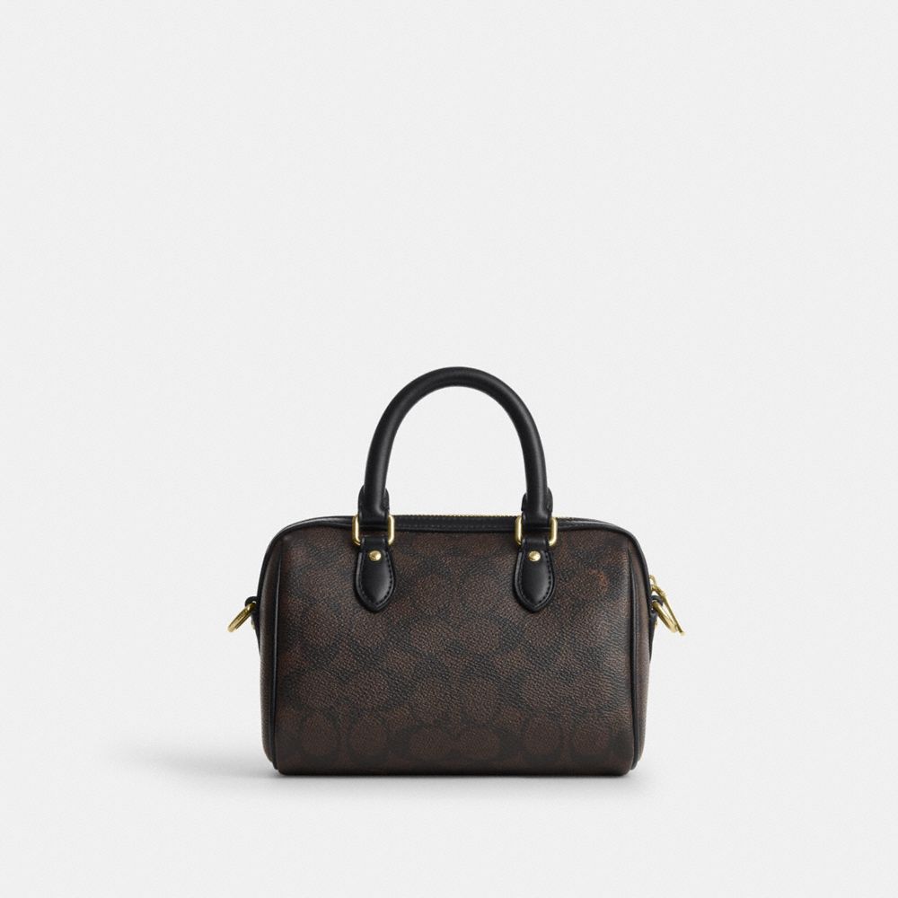 Mini Rowan Crossbody Bag In Signature Canvas