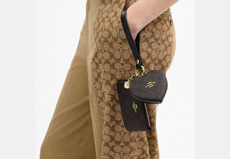 Wristlet And Heart Pouch In Signature Canvas With Charm