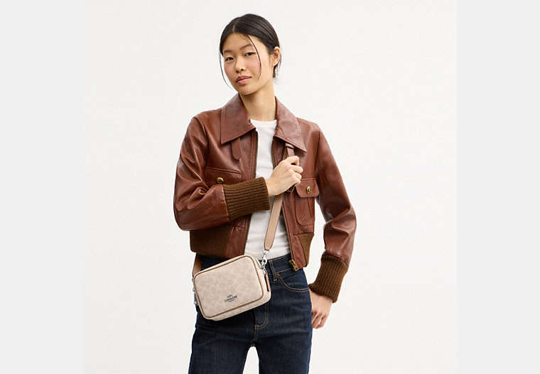 Mini Carey Crossbody Bag In Signature Canvas