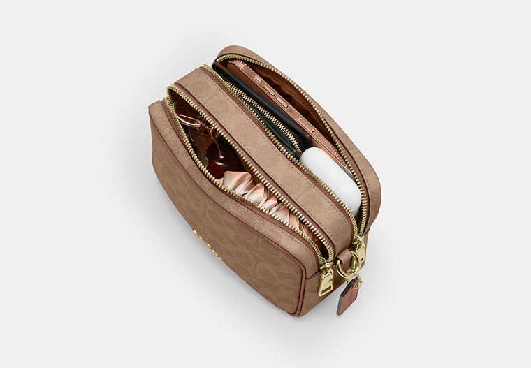 Mini Carey Crossbody Bag In Signature Canvas