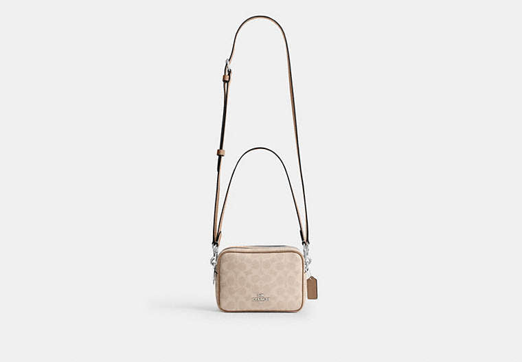 Mini Carey Crossbody Bag In Signature Canvas
