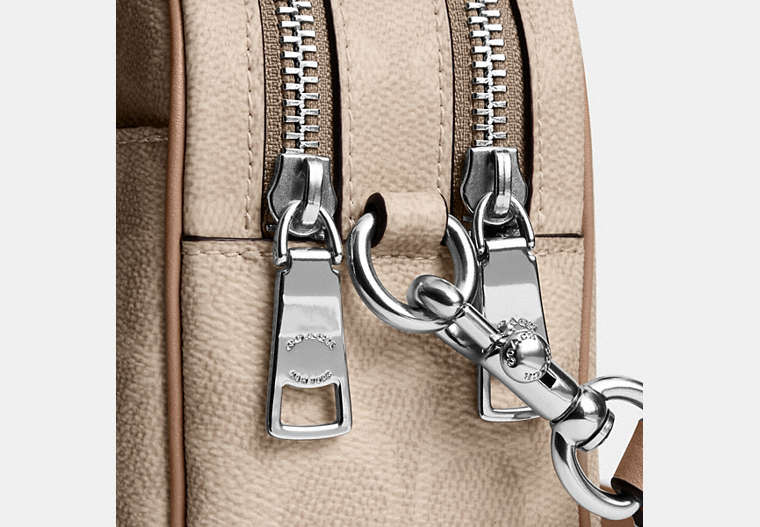 Mini Carey Crossbody Bag In Signature Canvas