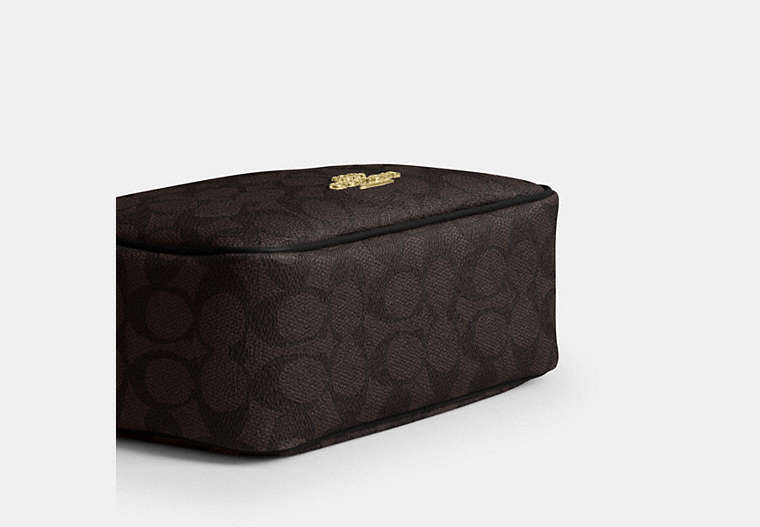 Mini Carey Crossbody Bag In Signature Canvas