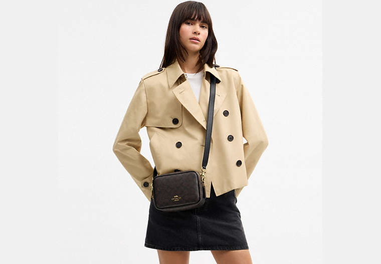 Mini Carey Crossbody Bag In Signature Canvas