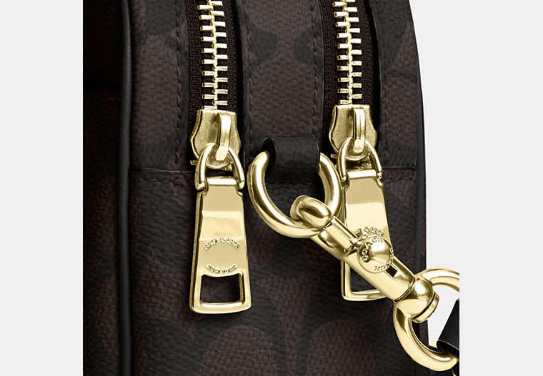 Mini Carey Crossbody Bag In Signature Canvas