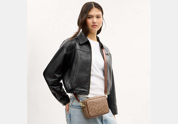 Mini Carey Crossbody Bag In Signature Canvas