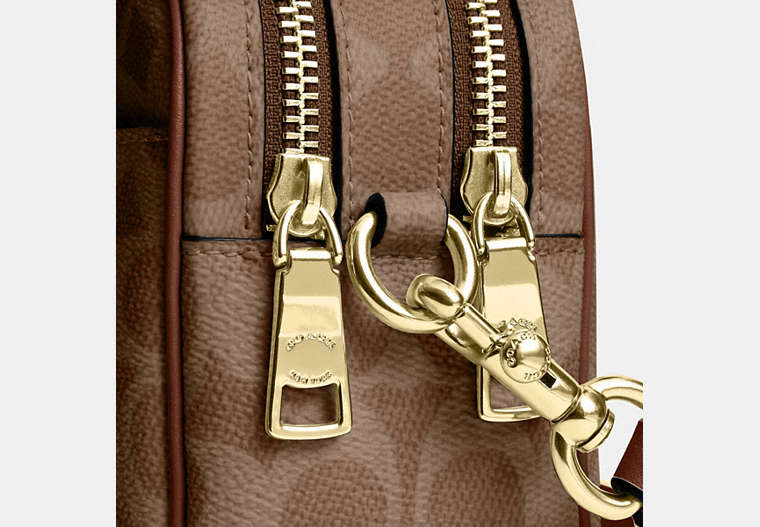 Mini Carey Crossbody Bag In Signature Canvas