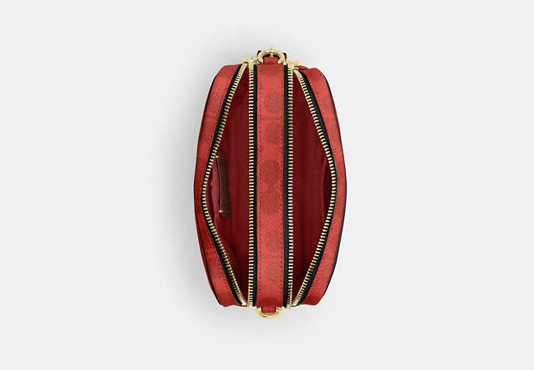 Mini Carey Crossbody Bag In Signature Canvas