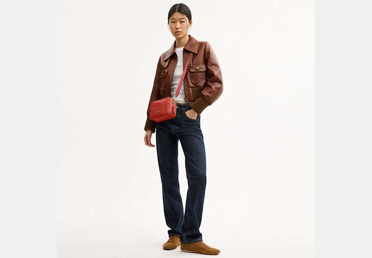 Mini Carey Crossbody Bag In Signature Canvas