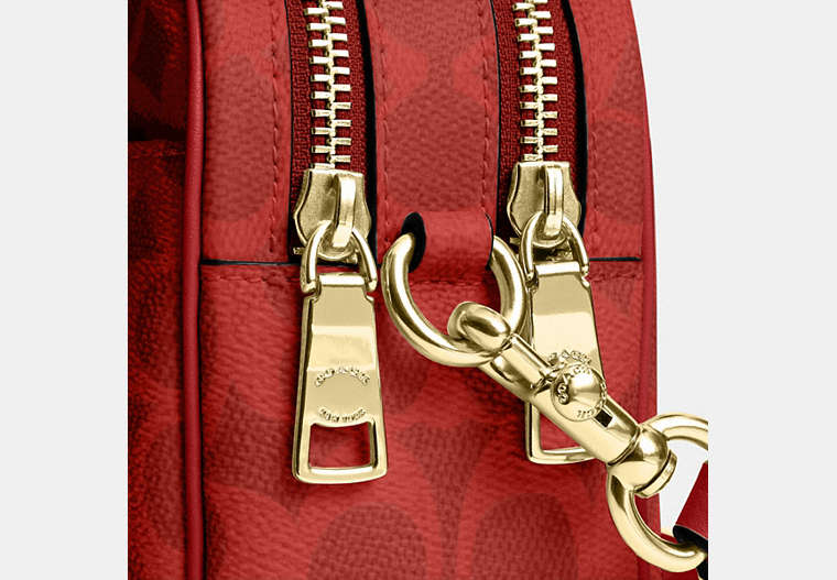 Mini Carey Crossbody Bag In Signature Canvas