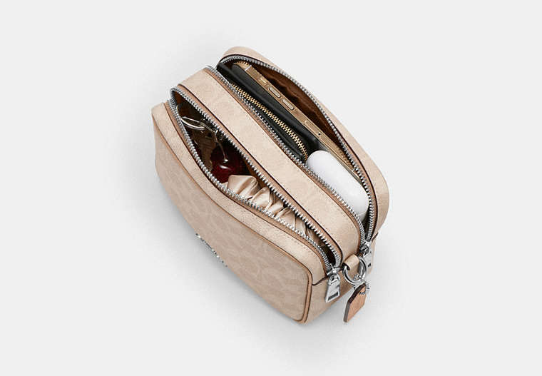 Mini Carey Crossbody Bag In Signature Canvas