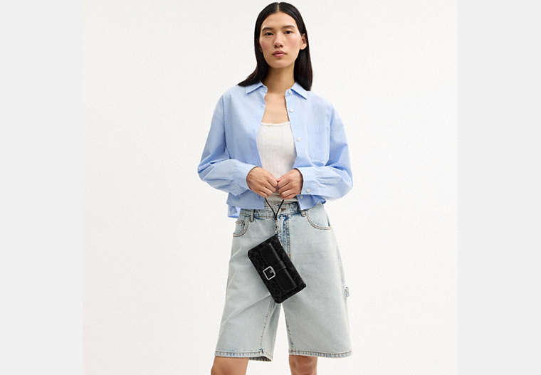 Ashton Wristlet In Signature Denim