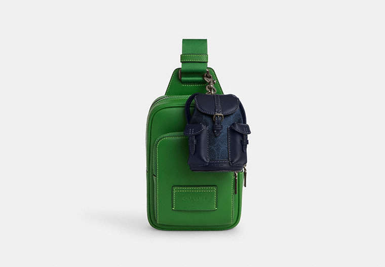 Mini Warner Backpack Bag Charm In Signature Canvas