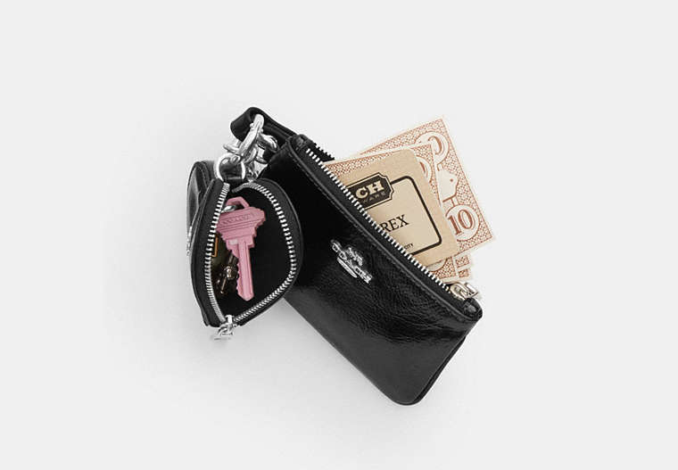 Wristlet And Heart Pouch With Charm