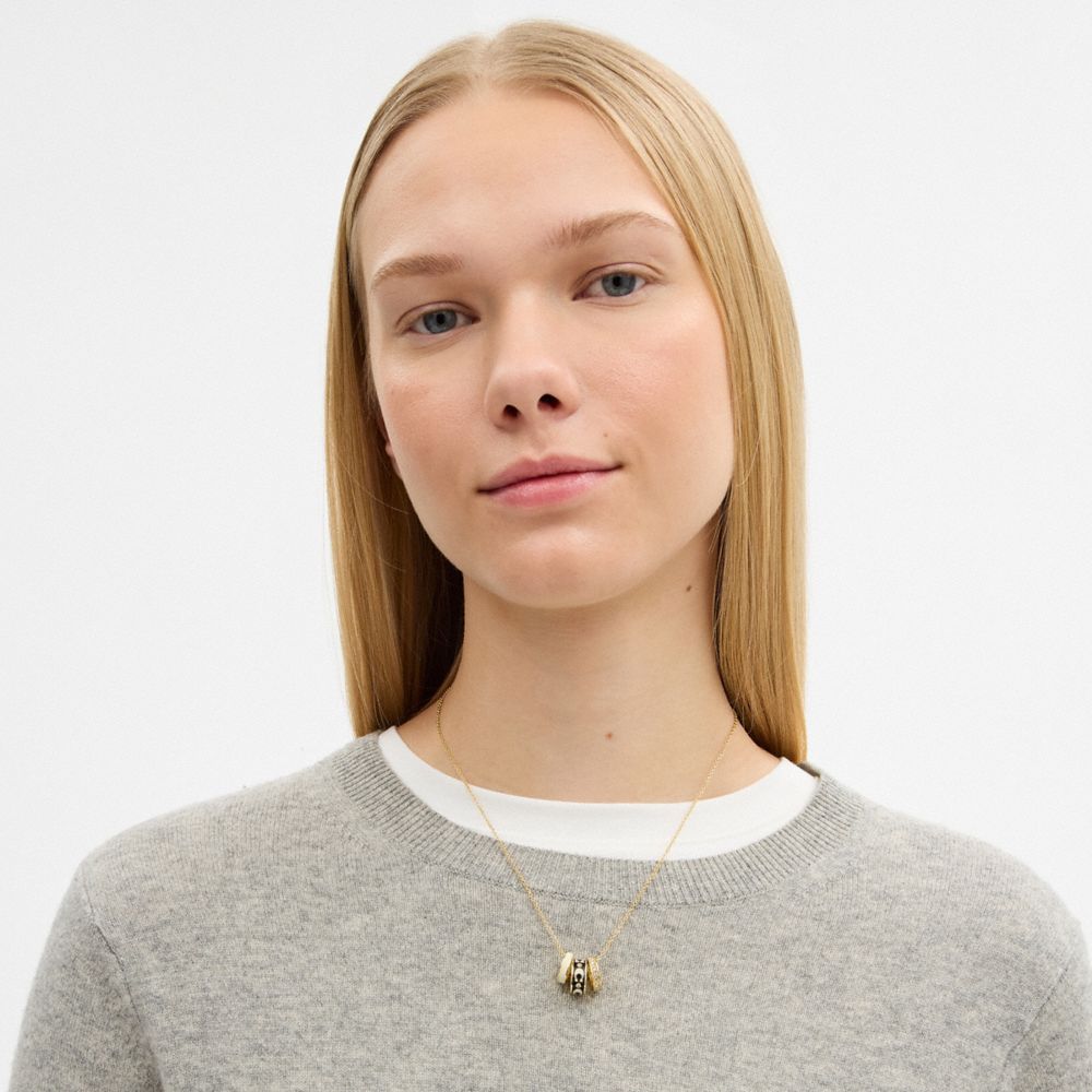 Repeated C Rondelle Necklace
