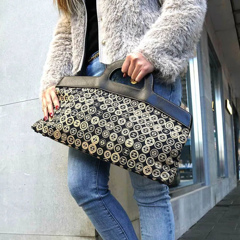 JS003 - CHANEL Navy Cotton Handbag