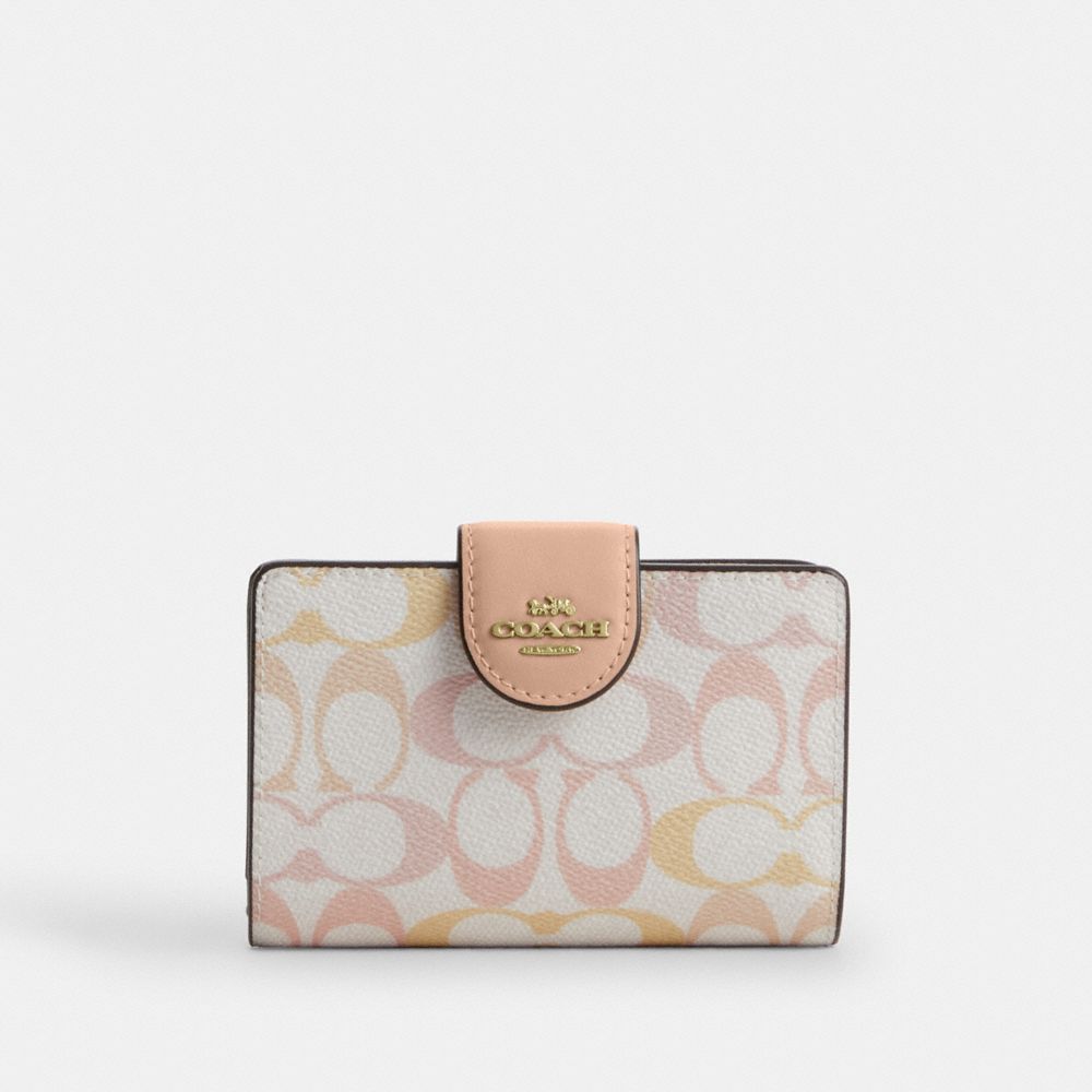 Coach Medium Corner Zip Wallet In Signature Canvas Gold Chalk Pink
